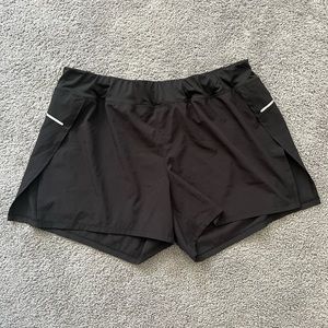 Avia XL black workout shorts with built in biker shorts and slit hem sides